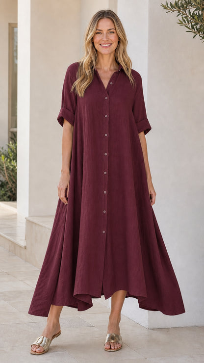 Front view of woman wearing burgundy button-down midi shirt dress