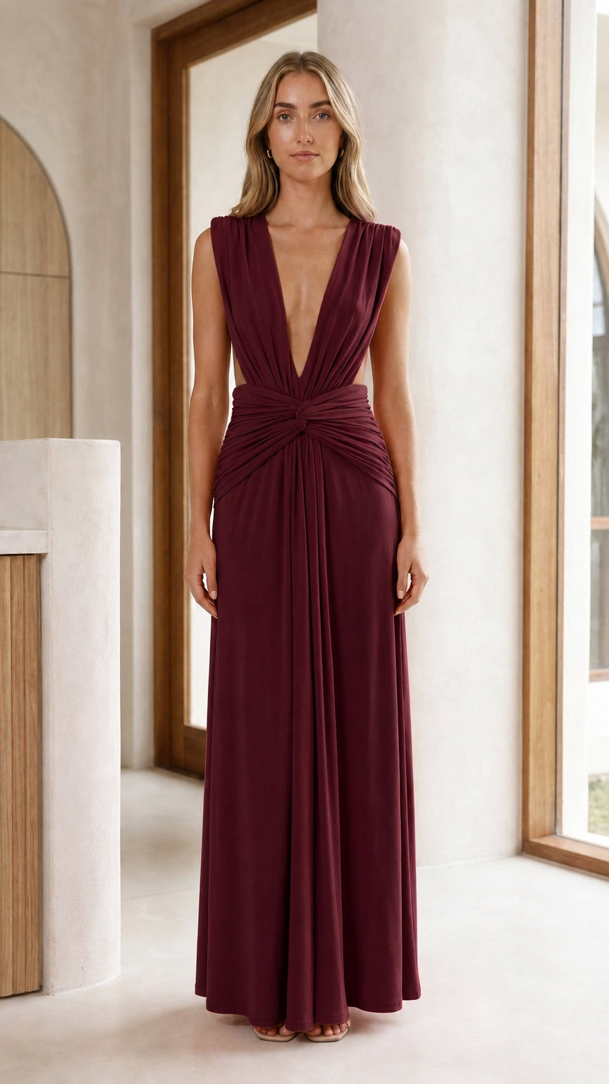 Front view of burgundy plum plunge neckline twist front maxi gown