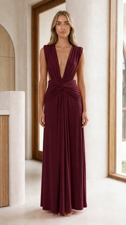 Front view of burgundy plum plunge neckline twist front maxi gown