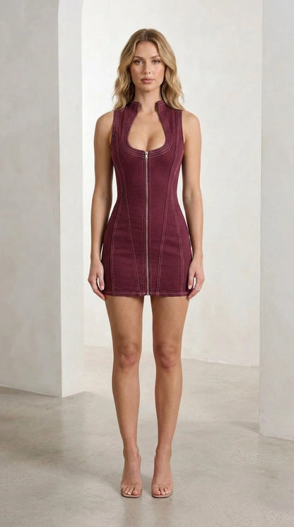 Front view of burgundy denim mini dress on model