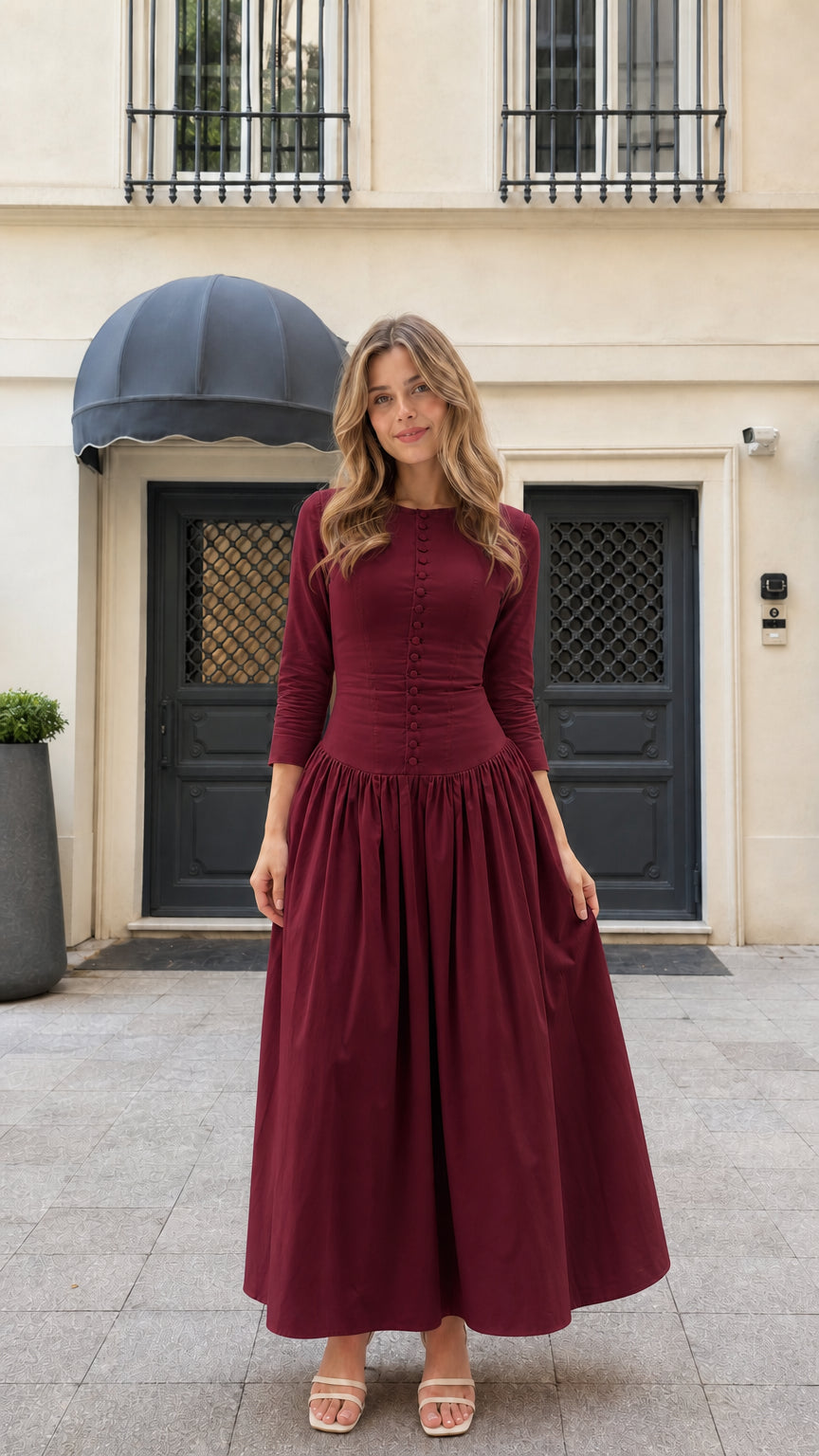Model wearing burgundy wine red 3/4 sleeve pleated button-front maxi dress