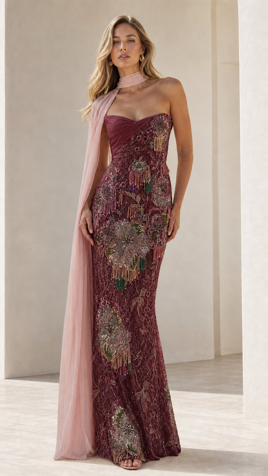 Front view of burgundy floral beaded evening dress