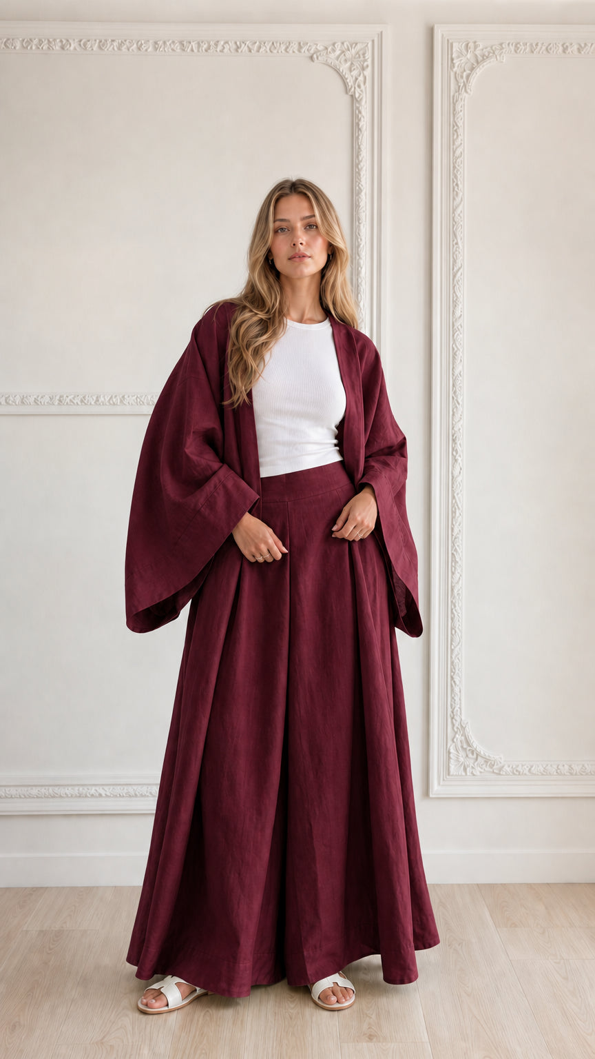 Full-length view of woman wearing burgundy wine-colored 2-piece kimono pant set