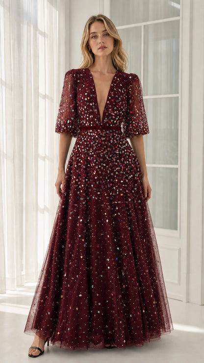 Front view of burgundy crystal-embellished tulle evening gown