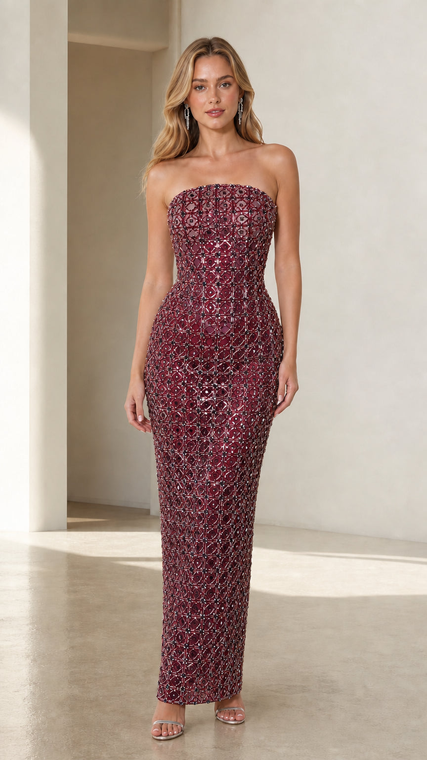 Front view of burgundy beaded evening party dress
