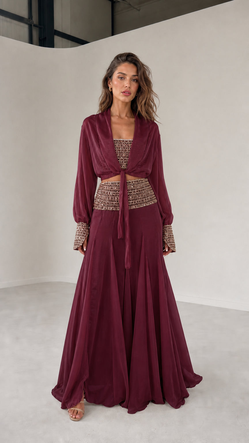 Model wearing burgundy three-piece chiffon set