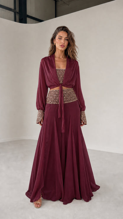 Model wearing burgundy three-piece chiffon set