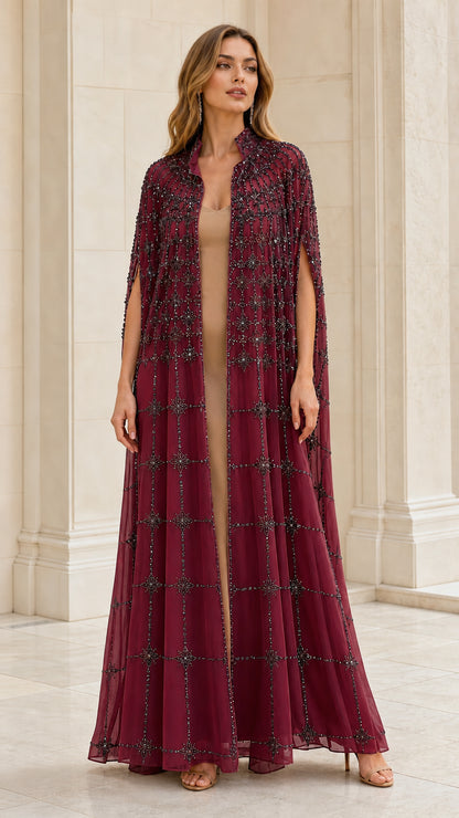 Front view of burgundy embellished evening cape and gown set