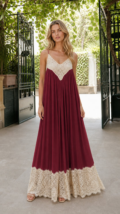 Front view of woman wearing burgundy wine red cami maxi dress with beige crochet lace hem