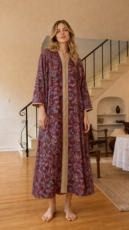 Front view of burgundy floral embroidered kaftan dress