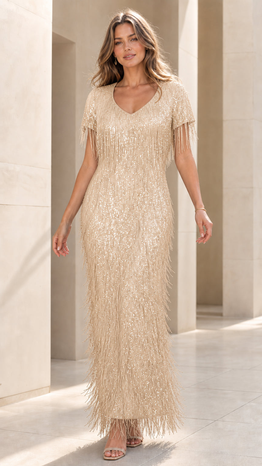 Model wearing champagne sequin fringe evening dress