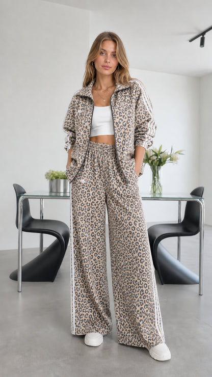 Model wearing beige leopard print track set