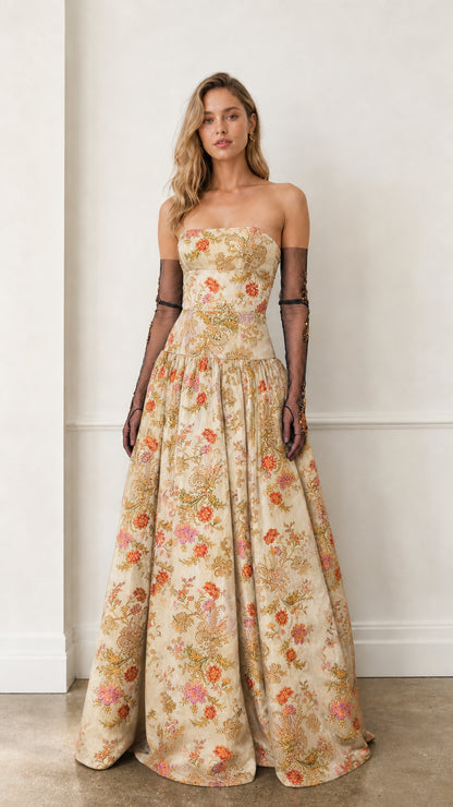 Front view of champagne floral strapless evening gown