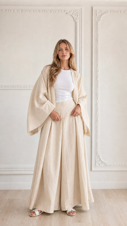 Full-length view of woman wearing neutral beige 2-piece wide leg lounge set