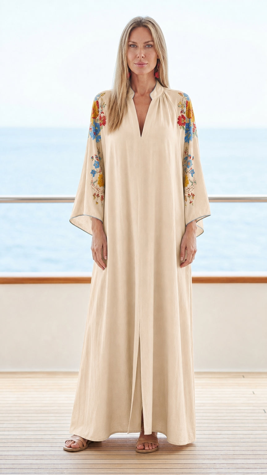 Model wearing beige floral embroidered maxi kaftan dress