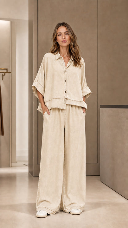 Full front view of model wearing beige two-piece pants set