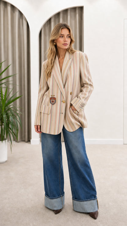 Model wearing Beige Cream striped collegiate blazer jacket